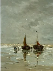 Bateaux et pêcheurs sur la plage